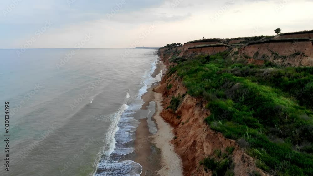 Aerial view of Sanzheyka village, Odessa region. Shot from a drone resort on the Black Sea, the village of Sanzheyka. Place of wild rest in Odessa. Clay cliff on the Black Sea coast in Odessa. Aerial view of Sanzheyka village, Odessa region. Shot from a drone resort on the Black Sea, the village of Sanzheyka. Place of wild rest in Odessa. Clay cliff on the Black Sea coast in Odessa.