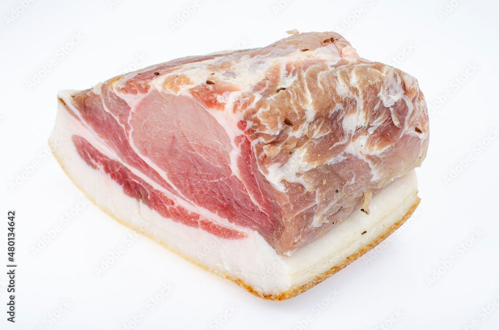 Piece of salted pork meat on white background. Studio Photo Piece of salted pork meat on white background. Studio Photo