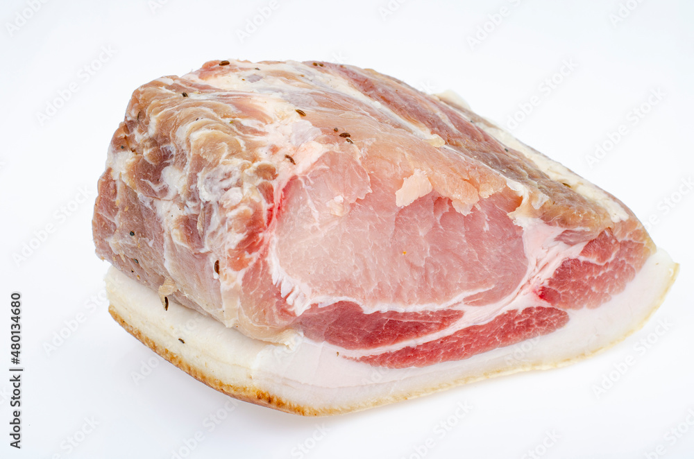 Piece of salted pork meat on white background. Studio Photo Piece of salted pork meat on white background. Studio Photo