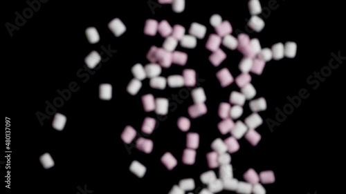 One large marshmallow explodes and shatters into many small marshmallows.
