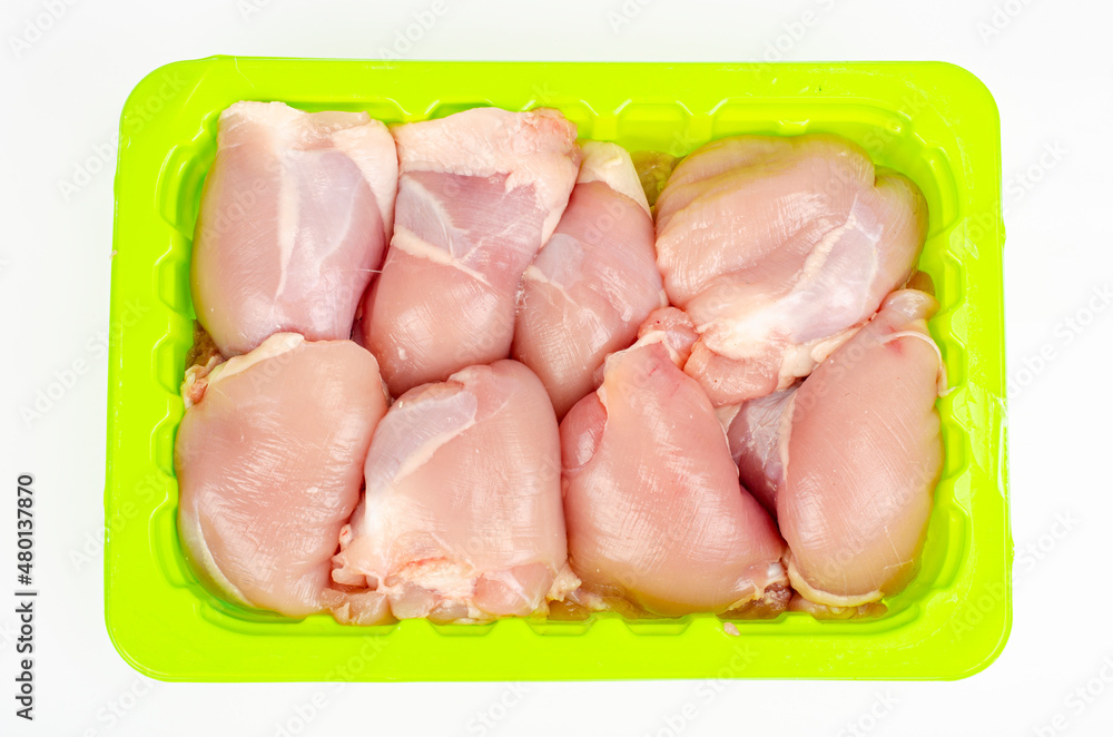 Pieces of chicken thigh meat without skin and bone. Studio Photo Pieces of chicken thigh meat without skin and bone. Studio Photo