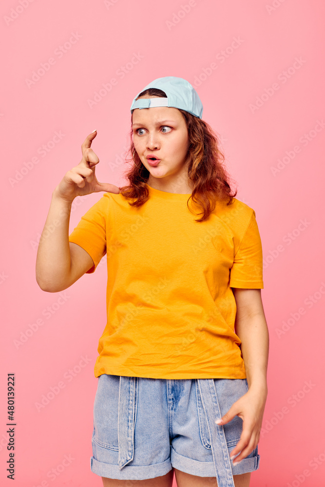 portrait of a young woman grimace posing summer style fashion isolated backgrounds unaltered portrait of a young woman grimace posing summer style fashion isolated backgrounds unaltered