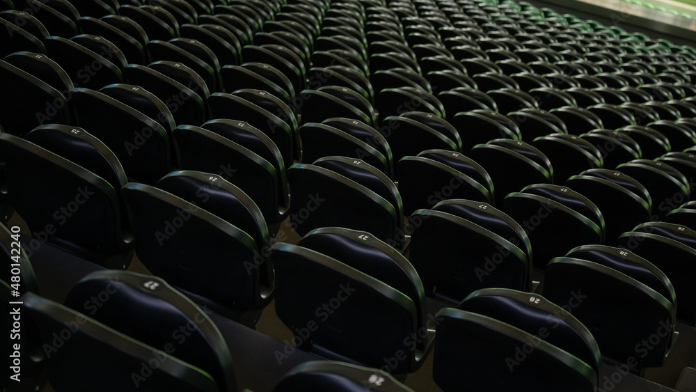 Fototapeta premium Empty stadium tribune with green seats.