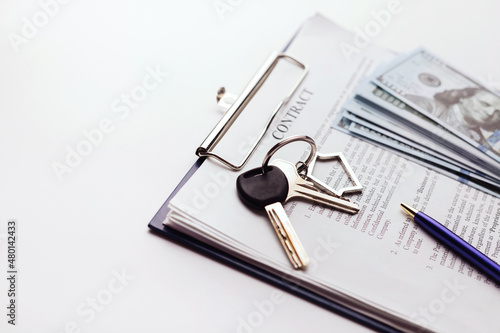 Wallpaper Mural Real estate purchase contract with money and home keys on white table. Torontodigital.ca