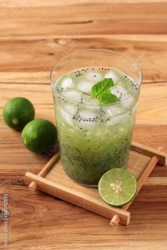 Es Timun Serut or Le Boh Timon. Indonesian Refreshment Drink made from Shredded Cucumber with Lime and Sweet Basil Seeds
