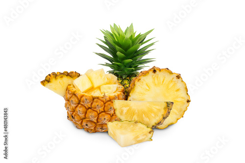 whole pineapple and pineapple slice. Pineapple with leaves isolate on white. Full depth of field. summer fruits,