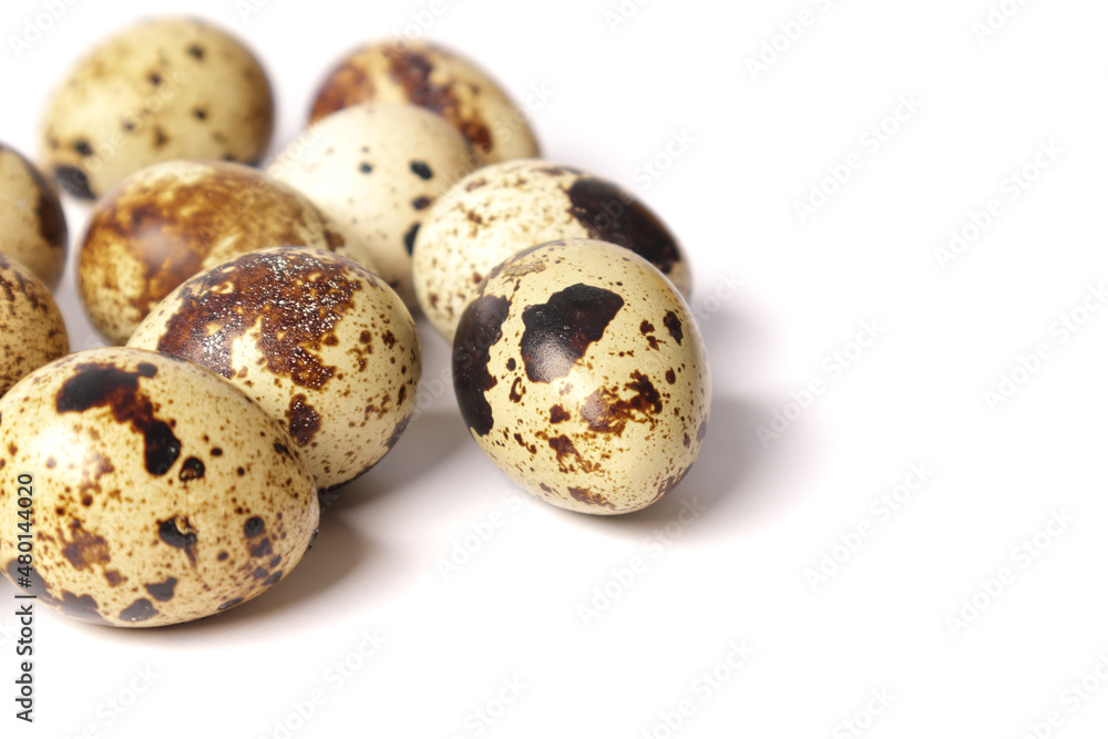 Quail eggs isolated on white background. Healthy food concept. Selective focus