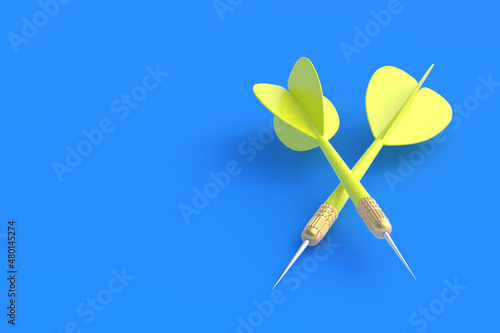 Toys for adults and children. Game for leisure. International tournament, competitions. Yellow darts on a blue background. Copy space. 3D rendering