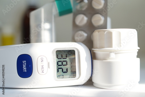 thermometer to the infrared,medicines for fever and cough - hyperthermia.Coronavirus, (covid -19)