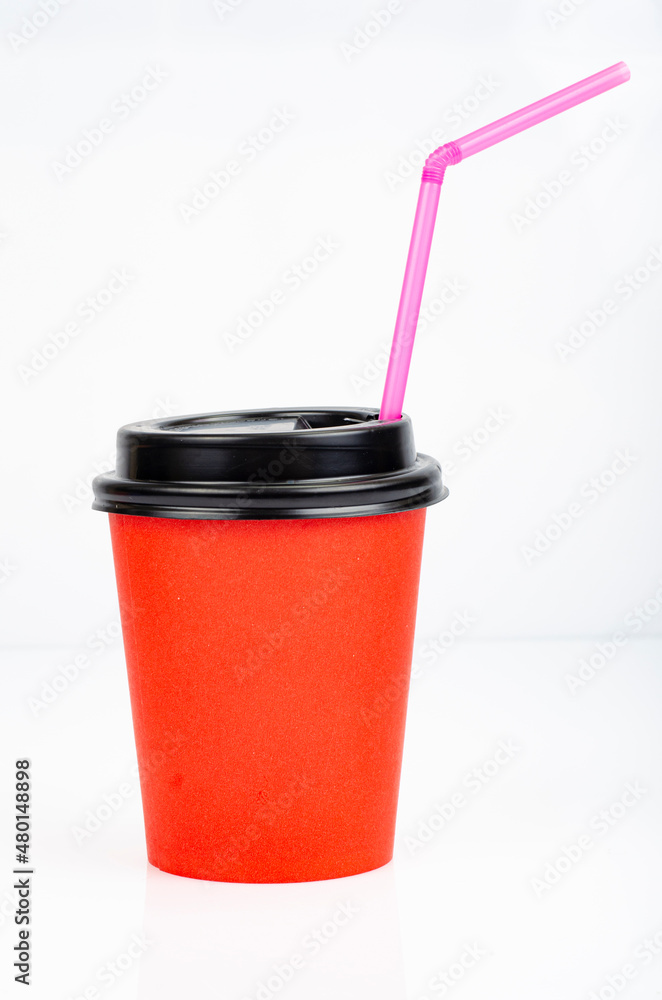 Red eco cardboard glass for drinks. Studio Photo. Red eco cardboard glass for drinks. Studio Photo.