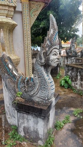 Thai Northern Statue of Naga with Human face in wat