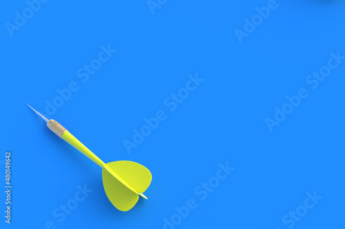 Toys for adults and children. Game for leisure. International tournament  competitions. Yellow dart on a blue background. Copy space. Top view. 3D rendering