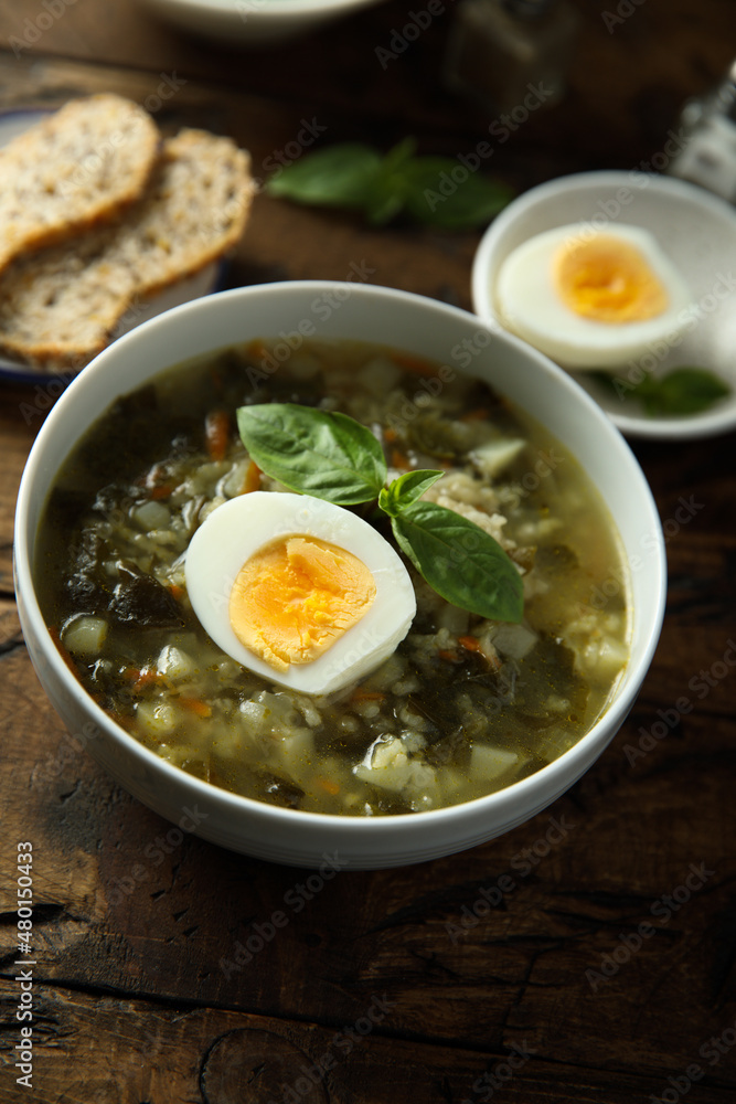 Traditional homemade green soup with hard boiled eggs Traditional homemade green soup with hard boiled eggs