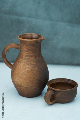       Ceramics, a ceramic product made with your own hands, made on a potter's wheel, a jug, a mug, clay.        © nikolay_alekhin