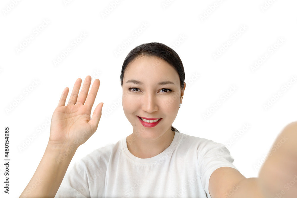 attractive asian woman waving hand in cafeteria, selfie, taking blog on white isolated background. happy woman smiling over video call attractive asian woman waving hand in cafeteria, selfie, taking blog on white isolated background. happy woman smiling over video call