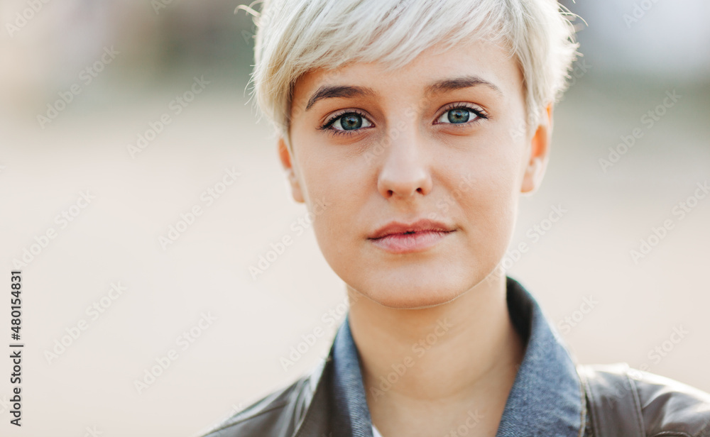 portrait of beautiful blond young woman outdoors portrait of beautiful blond young woman outdoors
