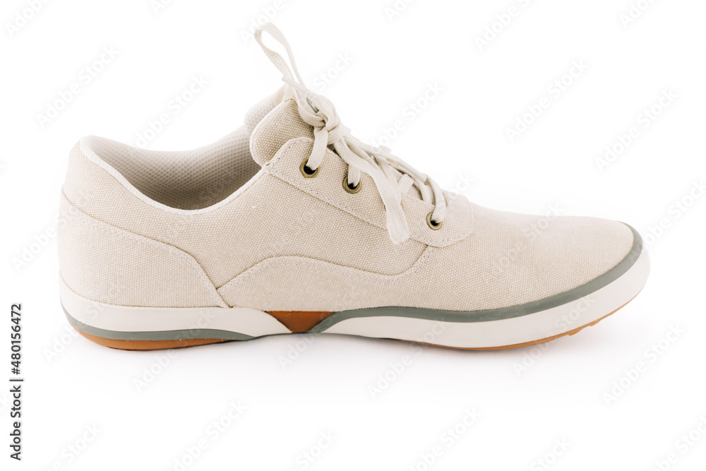 Men's shoes made of natural fabric, insulated on a white background.