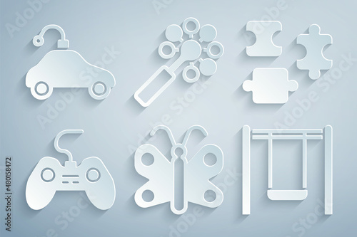 Set Butterfly, Puzzle pieces toy, Gamepad, Swing, Rattle baby and Radio controlled car icon. Vector