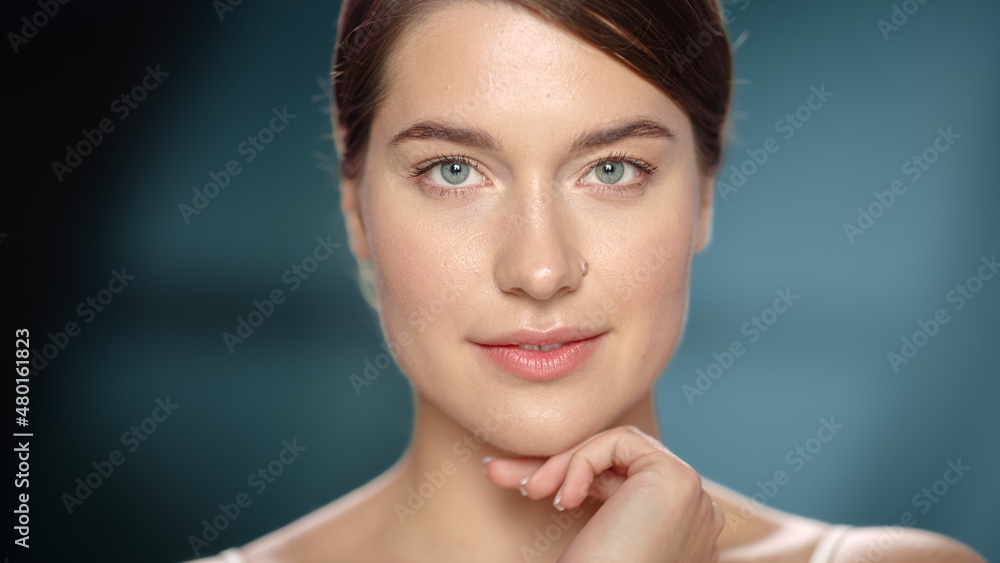 Close Up Female Beauty Portrait. Happy Caucasian Woman with Natural, Clean, Healthy Skin, Brown Hair and Light Green Eyes Posing and Smiling. Wellness and Skincare Concept on Soft Isolated Background. Close Up Female Beauty Portrait. Happy Caucasian Woman with Natural, Clean, Healthy Skin, Brown Hair and Light Green Eyes Posing and Smiling. Wellness and Skincare Concept on Soft Isolated Background.