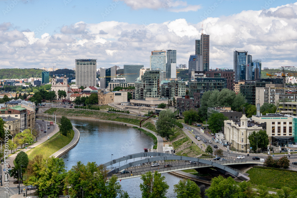 modern downtown city on the coast of river and clouthy sky modern downtown city on the coast of river and clouthy sky