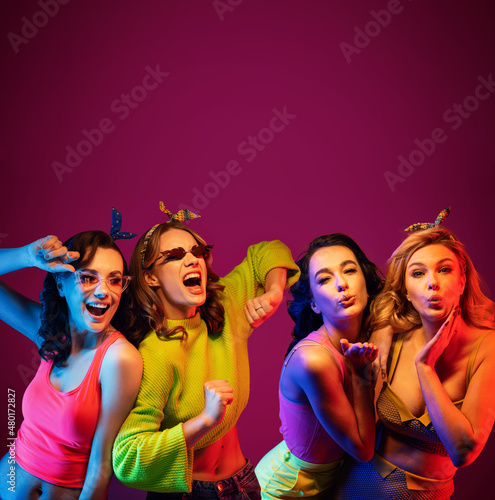 Group of four sexy beautiful young happy women