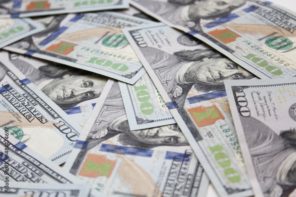 100 dollar US banknotes placed on a white background. 100 dollar US banknotes placed on a white background.