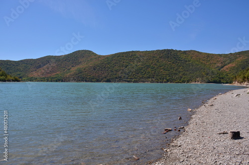 Emerald water of the mountain lake Abrau.