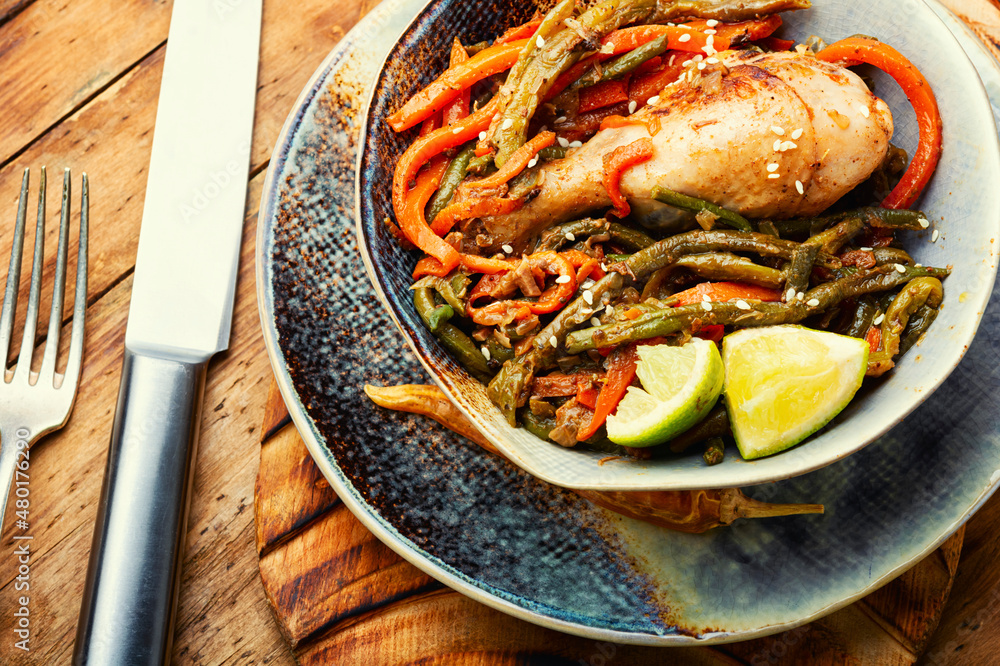 Chicken legs grilled with spices and vegetables. Chicken legs grilled with spices and vegetables.