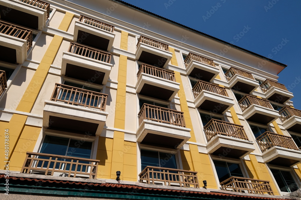 Obraz premium Building facade with many identical balconies