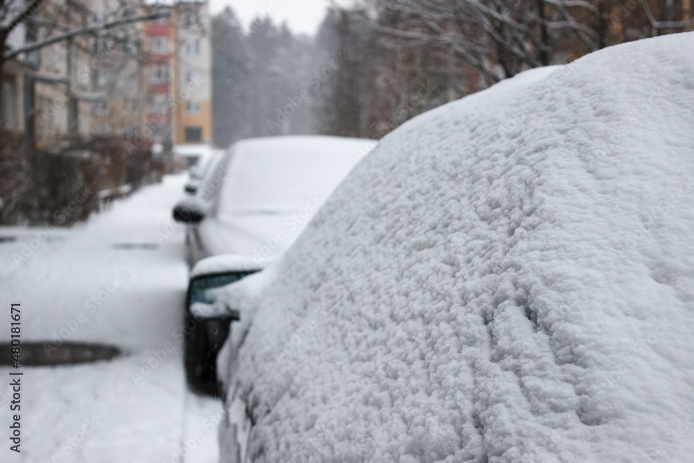 car covered with snow in winter car covered with snow in winter