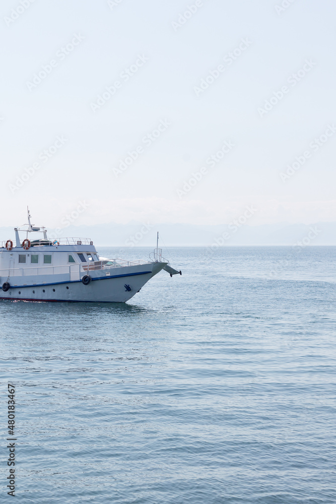 A pleasure ship on Lake Baikal far from shore. A pleasure ship on Lake Baikal far from shore.
