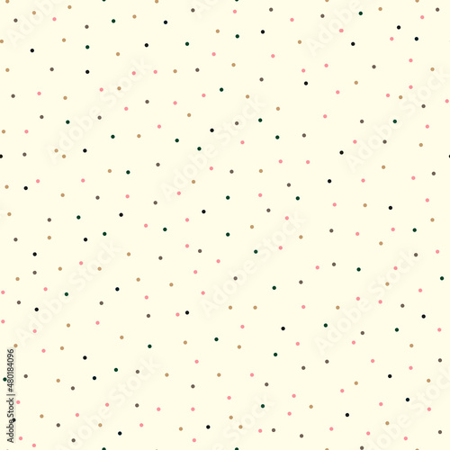 Seamless pattern, small polka dots on a beige background