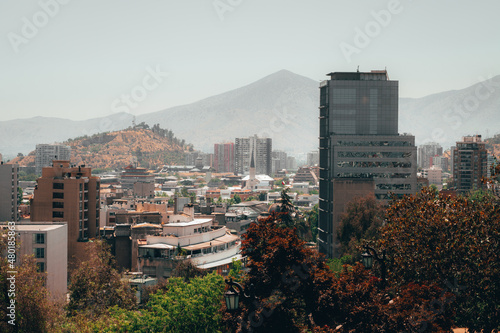 View of downtown buildings in Santiago de Chile with mountains in the background