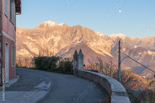 Apuan Alps with marble quarries viewed from Fontia, Carrara; the Apuan Alps (Alpi Apuane in Italian) are a mountain range in northern Tuscany in Italy, known for its Carrara Marble photo