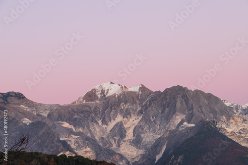 Carrara s side of the Apuan Alps with marble quarries  the Apuan Alps  Alpi Apuane in Italian  are a mountain range in northern Tuscany in Italy  known for its Carrara Marble