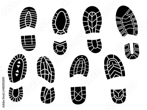 Set of footprints of shoes. Collection of sole mark  from human shoes. Hiking trace. Vector illustration of step on white background. 