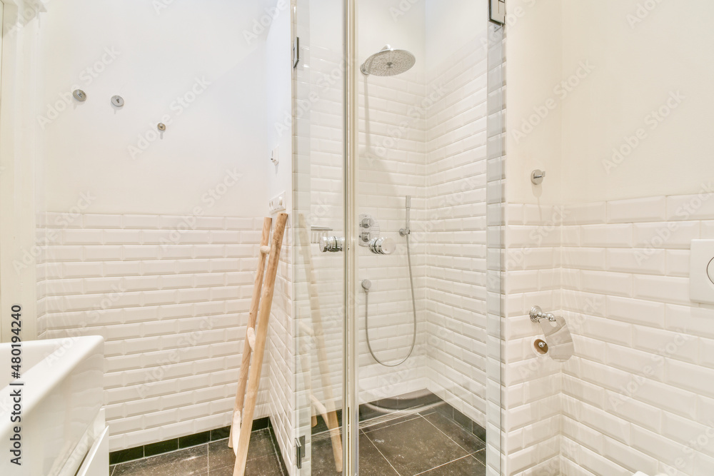 Interior of bathroom with shower cabin Interior of bathroom with shower cabin