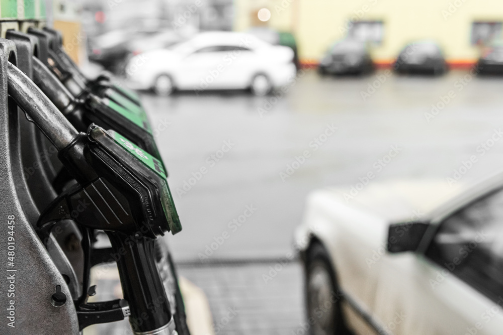 Fototapeta premium Service for refueling vehicles and cars with gas, gasoline and fuel oil