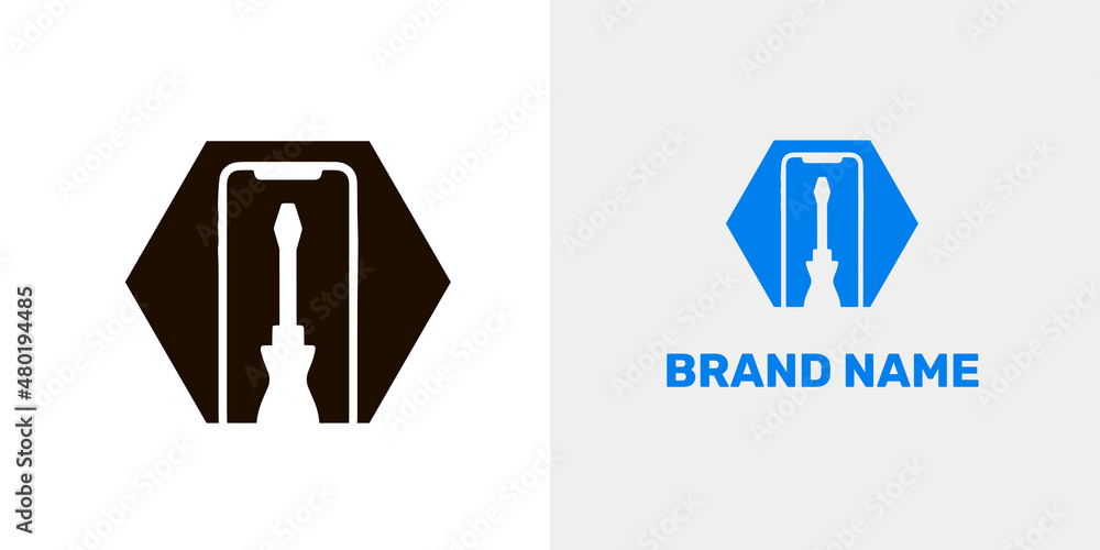 flat screwdriver on the background of touch modern phone flat screwdriver on the background of touch modern phone