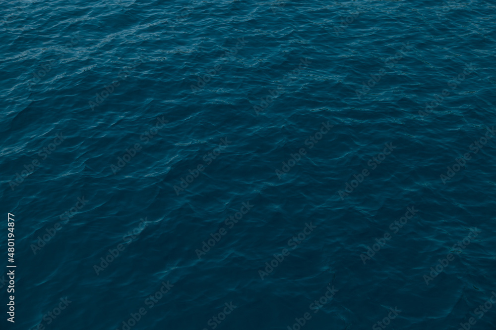 Beautiful sea surface, texture and color of sea water. Mockup, background, copy space. Beautiful sea surface, texture and color of sea water. Mockup, background, copy space.
