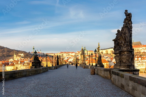 Prague in the morning, Charles bridge on a background of blue sky, cityscape