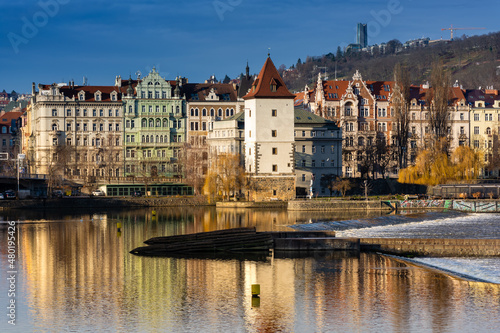 Prague in the morning, cityscape, reflection of buildings in the Vltava river