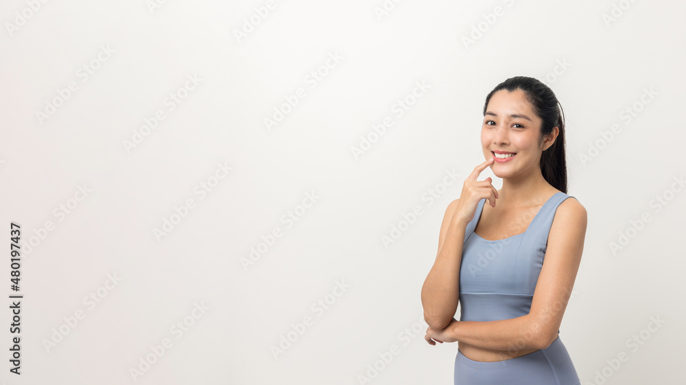 Happy Young beautiful asian woman with sportswear on isolated white background. Portrait sporty woman standing pose exercise workout in studio. Happy Young beautiful asian woman with sportswear on isolated white background. Portrait sporty woman standing pose exercise workout in studio.