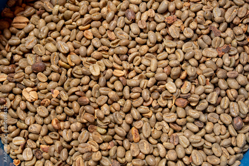 Background with coffee beans in the foreground. Background with coffee beans in the foreground.