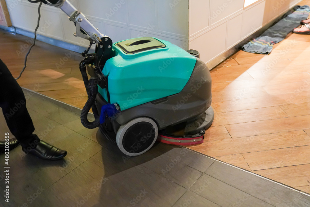 cleaning machine working on the floor. cleaning machine working on the floor.
