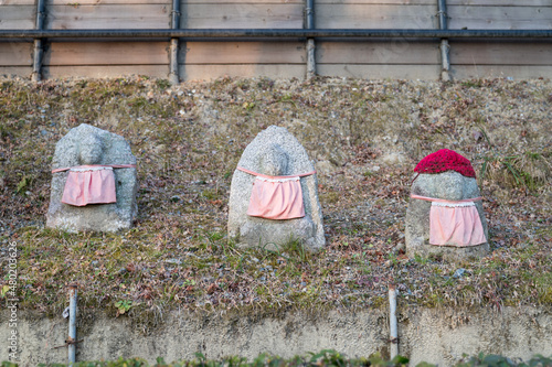 Three Buddha stone statue at kiyomizu-dara, Japan. photo