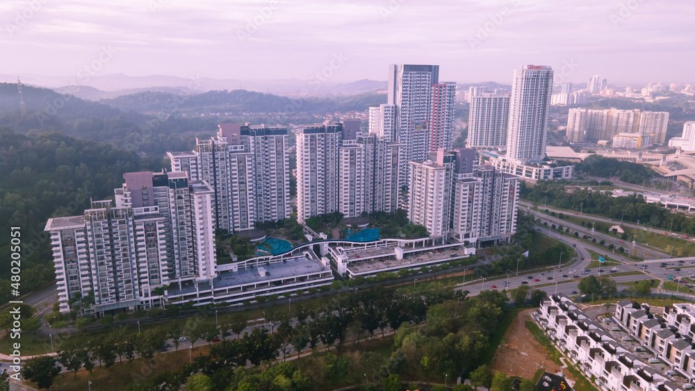 Obraz premium An aerial view of luxury highrise residential condominium neighbourhood during sunrise