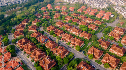An aerial top down view of luxury residential neighbourhood during sunrise