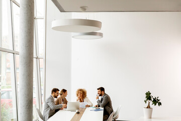 Multiethnic young business people working together in the office