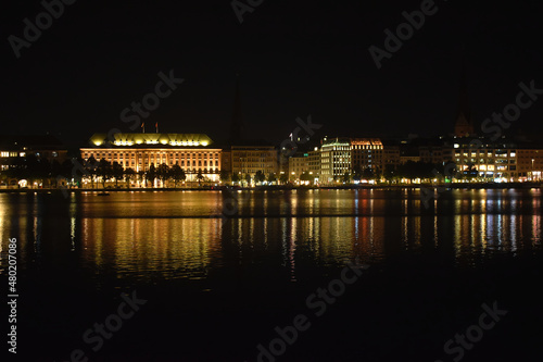 Hamburg at night with reflection in the water